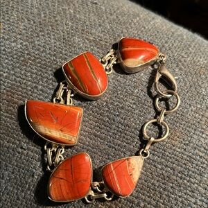 Elegant Red Stone Bracelet
Hold for rianna